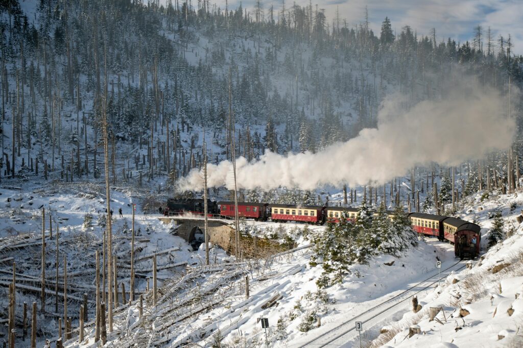 pexels-photo-30607211-30607211 Historic steam train traversing the snowy Harz Mountains in winter.